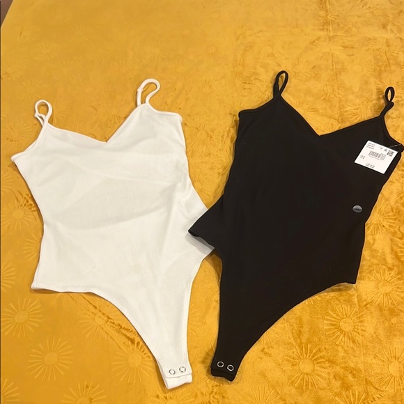 American Eagle Outfitters Tops - Women’s bodysuit Set of two- Black and White Cut Out Back